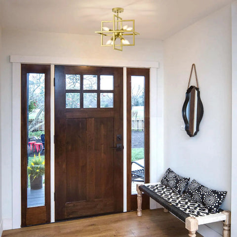 Black And Gold Dope Industrial 8 Light Geometric Pendant Chandelier in an entryway with wooden door and patterned bench.