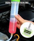 SWANLAKE 200cc fluid extractor syringe for automotive use; clear plastic with pink liquid, green cap, and attached hose.