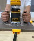 Professional Router Base Plate Compatible With Dwp611 And Dcw600b Routers used with a compact router on a wooden surface.