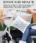 Waterproof Wet Dry Bag For Swim Gear And Travel with handle attached to stroller, blue wave pattern.
