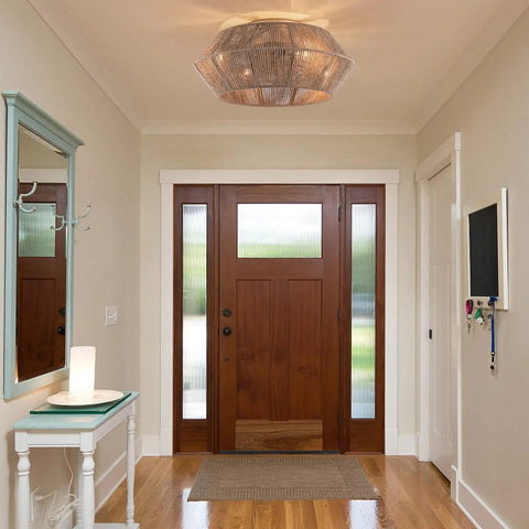 Handwoven Rattan Ceiling Fan with Light and Remote for Bedroom Living Room hanging in a modern entryway above a console table.