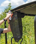 Heavy Duty UTV Trash Sack Durable PVC Mesh Garbage Bag for Trailside Cleanup attached to UTV, collecting debris with ease.
