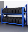 Badass Adjustable Tire Display Rack, Heavy Duty Double Deck Wheel Storage Cart with stacked tires in a blue frame.