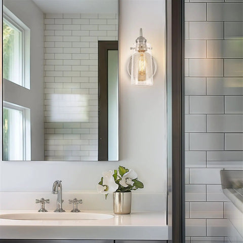 Kira Home Rayne 10" Modern Farmhouse Wall Sconce for Bathroom Vanity, Pack of 2, featuring a clear jar glass shade and brushed nickel finish.