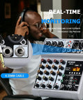 Person using the Five Channel USB Bluetooth Audio Mixer With Dope Echo Delay Effects And 48V Phantom Power, showing real-time monitoring feature.