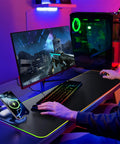 Wireless Charging Gaming Mouse Pad 15W With RGB Lighting, built-in phone holder, waterproof desk mat, non-slip, 35.4x11.8 inches, in use