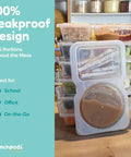 Two Compartment Reusable Snack Containers With Lids 20 Pack 40 Pieces Leak Proof Snack Prep Trays stacked on a table