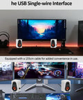 White USB powered computer speakers with built-in audio output on a desk, 12W beefy dual diaphragm stereo, wooden finish