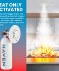 Automatic Heat Activated Fire Suppression Device With 135 Degree Sensor, heat-triggered unit beside flames during kitchen fire.