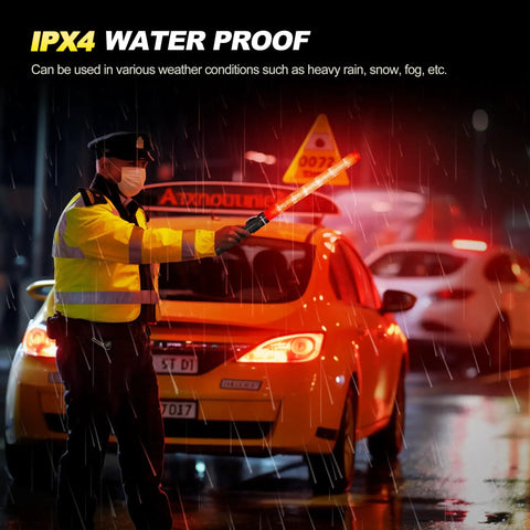 Person using 6-Piece 21-Inch Traffic Control Wand With 3 Flashing Modes Safety Baton Light for parking in rain
