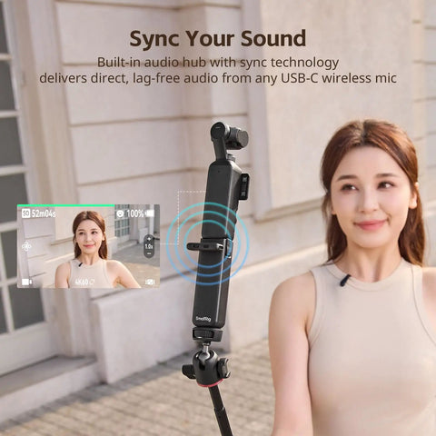 Woman using the 5000mAh Battery Grip For Pocket 4 By 3 Camera With 20W Fast Charge Wireless Microphone Pass Through.
