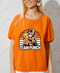 Orange shirt with "Team Punch" featuring cute babys monkey punchs trends meme DTF transfers for DIY clothing and T shirts.