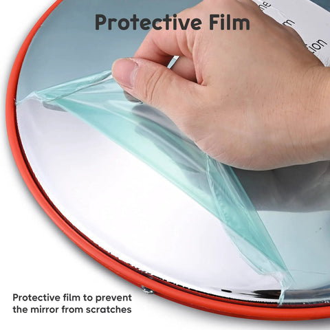 Hand removing protective film from 12 Inch Convex Safety Traffic Mirror Boasts Crisp Fisheye Vision for clear view.