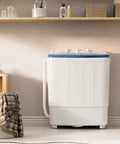 Gotta Love This Ultra Compact Portable Twin Tub Washer Straight Up Silver Ion Deep Clean 18 Pound Laundry Spinner Combo Built For Dorms Apartments And Rv Homes Easy Setup Blue in a small laundry space.