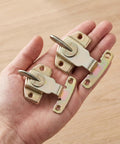 Built Tough Table Leaf Latches Rock Solid Extension Connectors Zero Fuss Assembly Galvanized Steel hardware held in hand.
