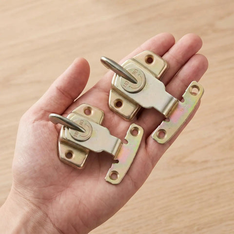 Built Tough Table Leaf Latches Rock Solid Extension Connectors Zero Fuss Assembly Galvanized Steel hardware held in hand.