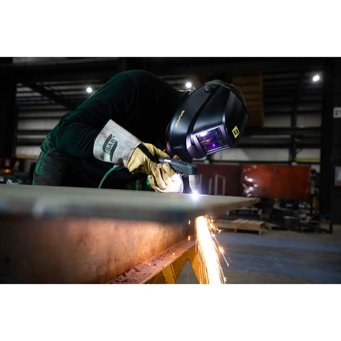 Welder using Savage A40 Black Auto Darkening Welding Helmet Pro Grade With External Shade Adjustment From DIN 9 To DIN 13 in workshop