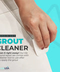 Hand using tile grout repair kit with premixed acrylic sanded grout, water resistant tube, fills cracks and gaps, gray, 8.8 oz.