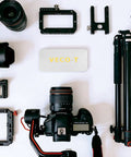 Top Shelf Stainless Steel 1/4 20 Camera Screw Set A Hella Tough 16 Pack Tripod Mount Kit For Camera Cages Monopods Quick Release Plates And Projectors To Get Your Camera Rig Locked In Fast laid out with cameras and accessories.