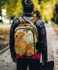 Person wearing Red Mailbox Yard Pup Printed Backpack for Everyday Use, showing dog print design, in park setting.