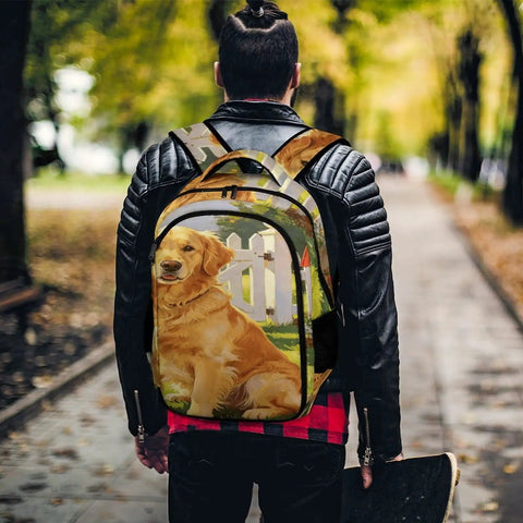 Person wearing Red Mailbox Yard Pup Printed Backpack for Everyday Use, showing dog print design, in park setting.