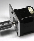 Close-up of a motor with a rigid heavy duty shaft coupling seven eighths inch bore one and three quarters inch outer diameter two inch length.