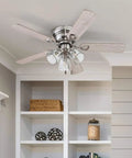 42 Inch Brushed Nickel Ceiling Fan With LED Light Kit installed in a room with white shelving and decorative items visible.