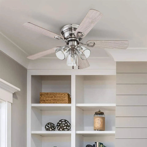 42 Inch Brushed Nickel Ceiling Fan With LED Light Kit installed in a room with white shelving and decorative items visible.