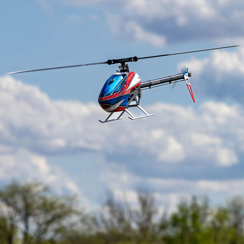 Fusion 700 Kit High Performance Super Combo flying with carbon fiber 700mm main rotor and 105mm tail blades in open sky