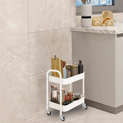 Durable 2 Tier Metal Rolling Cart With Handle And Locking Wheels White in a kitchen with jars and bottles organized on it