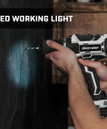 Beast Of A 20V Max Cordless Drill Set with LED light drilling into a wall, showing compact design and keyless chuck features.