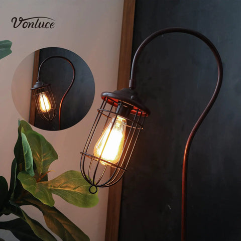 Industrial Floor Lamp With Adjustable Cage Shade, 62 Inch Tall Lantern Style Light In Brushed Reddish Bronze Finish, close-up view