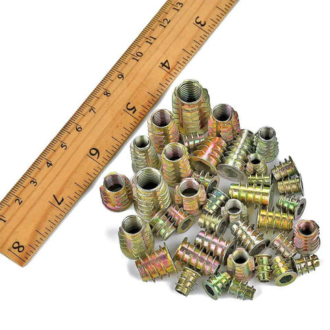 265 Piece Zinc Alloy Screw Nut Inserts Set For Wood Furniture with ruler for size reference.