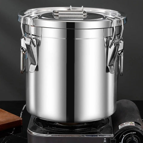 Heavyweight 304 Stainless Steel Food Storage Containers With Airtight Lids on a stove, ideal for keeping kitchen stash fresh.