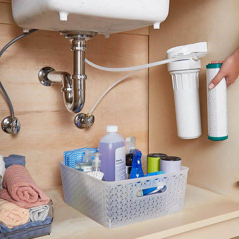 Universal 10 Inch Under Sink Water Filter Replacement, Single Stage Filtration, cartridge being installed in system