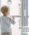 Child standing by window with 4 Pack Magnetic Door Catch 150lb Stainless Steel Heavy Duty Cabinet Magnets visible on frame.