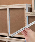 Beefy Heavy Duty Piano Hinges 3 Pack For Wood Boxes And Cabinets iron metal hinge shown against wooden frame