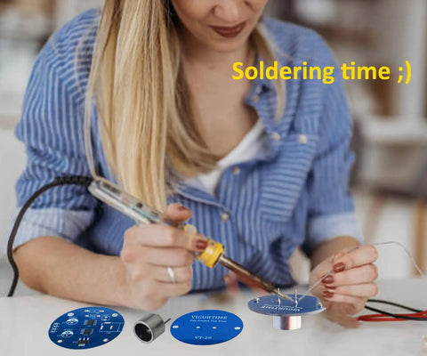 Woman using Ultrasonic Levitator Solder Practice Kit For Electronic Soldering Training at desk