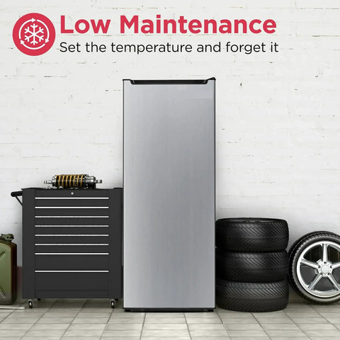 Seven Cubic Foot Convertible Upright Fridge Freezer Real Deal Smooth Operator With Click To Switch Dual Temp Modes For Garage Kitchen Or Dorm Room Built Tough next to tool chest and tires.