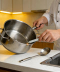 Close-up of a person using low temperature welding rods for quick bonding no flux needed solder sticks on a metal pot in a kitchen.
