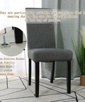 Durable M6 Screw On Leveling Feet For Furniture 24 Pack shown stabilizing a gray chair on a patterned floor