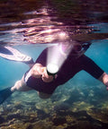 Diver using Beast Mode Bright 18000 Lumen Diving Flashlight Waterproof To 100 Meters LED Submersible Torch underwater.
