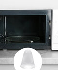 Heavy Duty Thirty Two Piece Cone Shaped Clear Rubber Bumpers With Powerful Self Adhesive Backing For Household Furniture That Is Bound To Keep Your Floors Looking Sharp in a microwave setting.