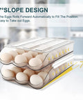 Auto Rolling Egg Holder For Fridge With Lid 3 Layer Clear Plastic Egg Dispenser And Organizer Stackable Tray System For Easy Egg Access Keeps Eggs Fresh And Handy No Lid Open Needed Fridge Storage Solution, showing eggs on a sloped tray.