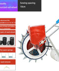 Manual Seed Planter Tool For Garden And Farm Portable Push Seeder With Seed Wheel And Spare Spring shown with accessories.