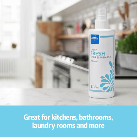 Odor Eliminator Spray 8 Oz Lightly Scented Pump Bottle on kitchen counter with blurred background, label facing camera