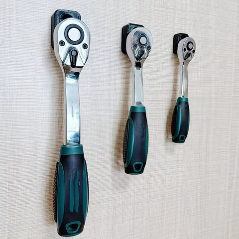 3-Piece Impact Ratchet Wrench Rack System For Home Garage Organization mounted on a wall with wrenches on display.