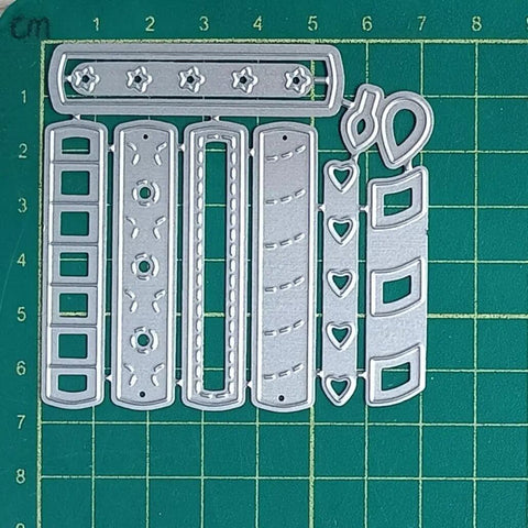 Happy Birthday Balloons Metal Die-Cuts For Scrapbookers And Card Makers on green grid background