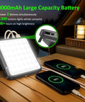 Rechargeable 20000mAh LED Camping Lantern With 1300 Lumen Brightness charging two phones on a wooden table.