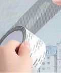 Hands applying Heavy Duty Mosquito Mesh Repair Tape 2M Patch for Dorm Screens and Curtains on window screen